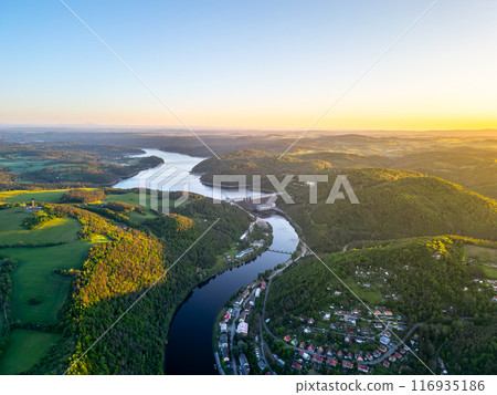 The Orlik Reservoir on Vltava River is largest hydroelectric water reservoir in Czechia. Aerial view from drone The Orlik Reservoir on Vltava River is largest hydroelectric water reservoir in Czechia. Aerial view from drone 116935186