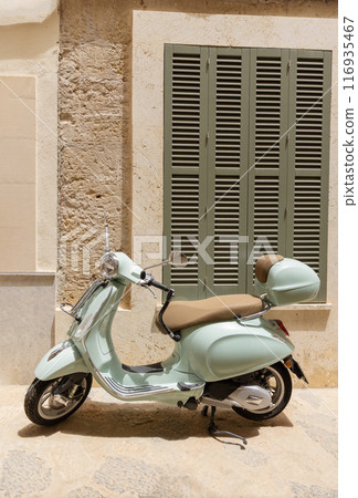 Retro scooter on the famous meditranian island of Mallorca, Spain 116935467