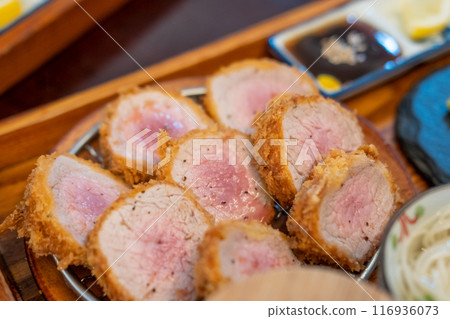 Sous vide pork katsu. Tonkatsu, Fried Pork serve on plate in restaurant Sous vide pork katsu. Tonkatsu, Fried Pork serve on plate in restaurant 116936073