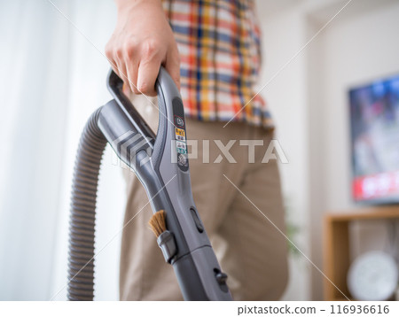 A man cleaning 116936616