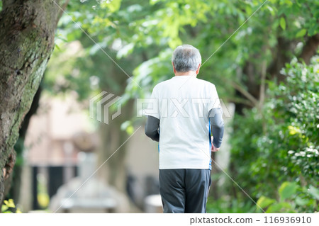 Senior man jogging, back view Senior man jogging, back view 116936910