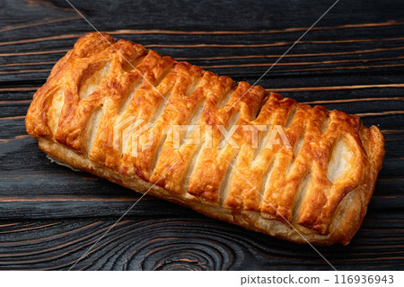 Golden Puff pastry stuffed with sausage and cheese 116936943