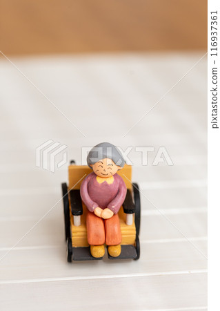 Grandma sitting in a wheelchair 116937361