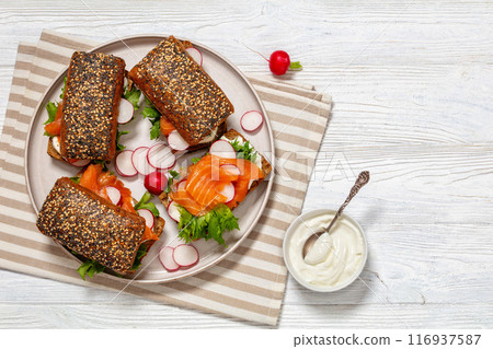 smoked salmon sandwiches on rye bread rolls 116937587