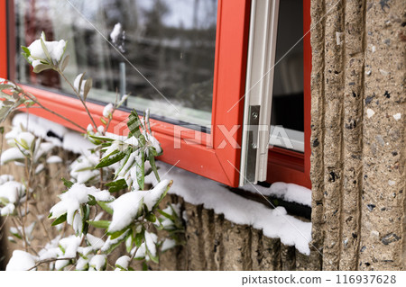 Open window in a house on a winter day. 116937628