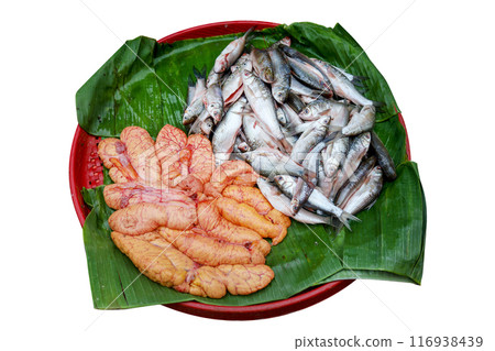 Top view of Fish eggs and Uncooked Blue spot mullet, or blue tail mullet, or Crenemugil seheli fish, focus selective 116938439