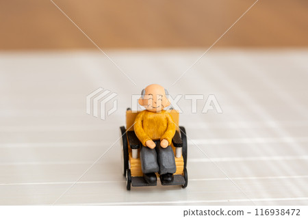 Handmade clay doll: Grandpa in a wheelchair 116938472