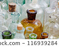 Big group of small empty glass bottles, aged and dusty 116939284