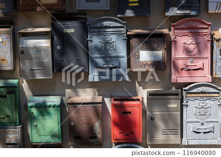 Variety of Vintage Mailboxes on Wall 116940080