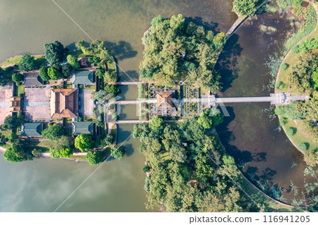 Minh Mang tomb near the Imperial City with the Purple Forbidden City within the Citadel in Hue, Vietnam. Minh Mang tomb near the Imperial City with the Purple Forbidden City within the Citadel in Hue, Vietnam. 116941205