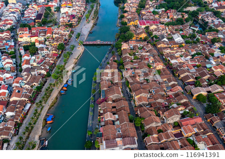 Aerial drone view of Hoi An city, Vietnam. Ancient town, UNESCO world heritage at Quang Nam province Aerial drone view of Hoi An city, Vietnam. Ancient town, UNESCO world heritage at Quang Nam province 116941391