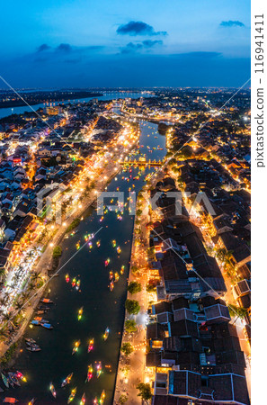 Aerial drone view of Hoi An city, Vietnam. Ancient town, UNESCO world heritage at Quang Nam province Aerial drone view of Hoi An city, Vietnam. Ancient town, UNESCO world heritage at Quang Nam province 116941411