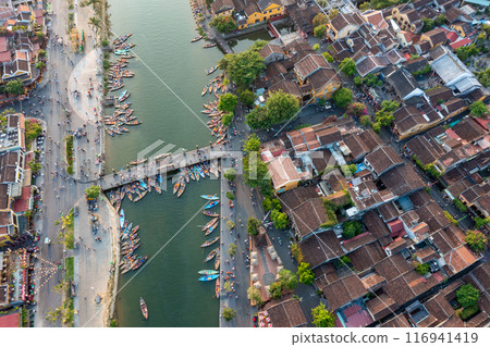 Aerial drone view of Hoi An city, Vietnam. Ancient town, UNESCO world heritage at Quang Nam province Aerial drone view of Hoi An city, Vietnam. Ancient town, UNESCO world heritage at Quang Nam province 116941419
