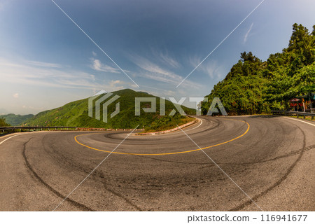 Hai Van pass - the famous road which leads along the coastline mountains near Da Nang city, Vietnam. 116941677