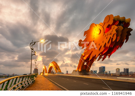 Dragon bridge in Danang at sunset which is a very famous destination for tourists 116941946