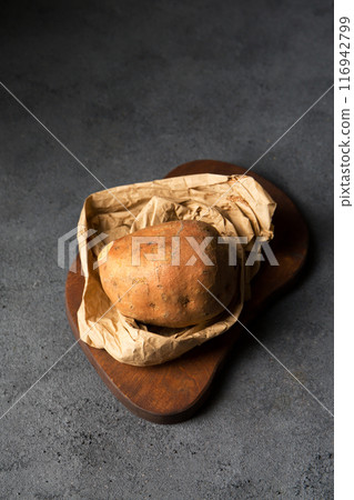 Large sweet potato in paper ecological packaging 116942799