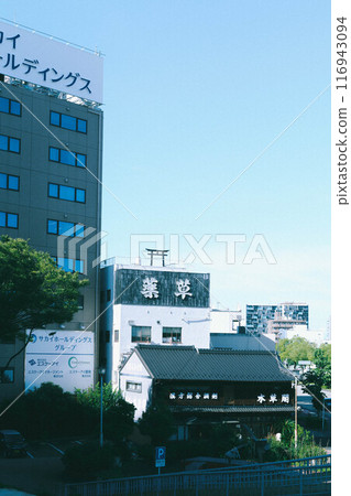 Torii gate on the roof of a building 116943094