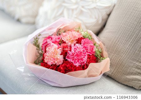Bouquet of flowers on the sofa 116943306