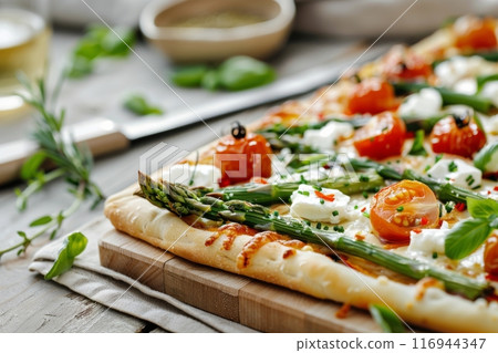 Asparagus and Tomato Pizza on Wooden Board Asparagus and Tomato Pizza on Wooden Board 116944347