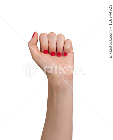 confident woman raising a strong fist, showcasing power and determination. The elegant, red-painted confident woman raising a strong fist, showcasing power and determination. The elegant, red-painted 116944925
