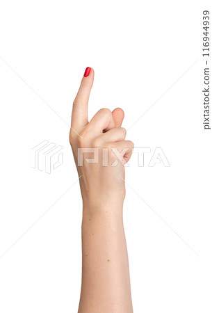 Female hand pointing, index finger extended and varnished in red, signaling direction. Right hand 116944939