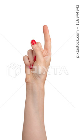 Female hand pointing, index finger extended and varnished in red, signaling direction. Right hand Female hand pointing, index finger extended and varnished in red, signaling direction. Right hand 116944942