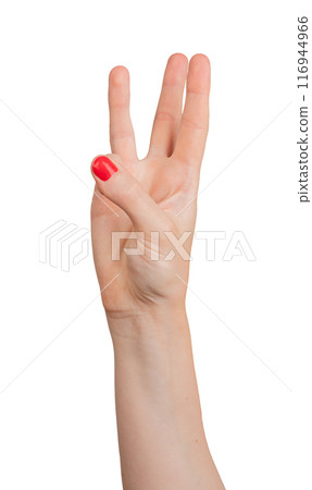 A hand showing the number three with three fingers (index, middle, and ring) raised, isolated A hand showing the number three with three fingers (index, middle, and ring) raised, isolated 116944966
