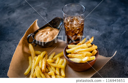 French fries with sauce and drink French fries with sauce and drink 116945651
