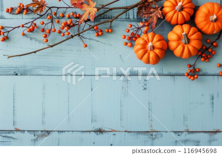 Pumpkins and Berries on Blue Wood Pumpkins and Berries on Blue Wood 116945698