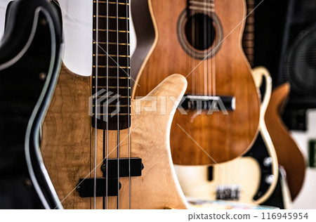 Bass guitar fretboardsand strings in music recording studio Bass guitar fretboardsand strings in music recording studio 116945954
