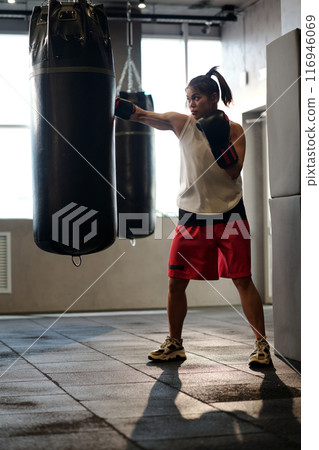 Practicing basic exercises and kicks Practicing basic exercises and kicks 116946069