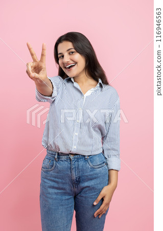 Charming Indian woman showing v sign 116946563