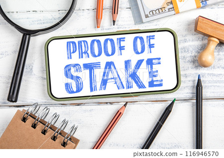Proof Of Stake. Mobile phone, money and stationery on the office table Proof Of Stake. Mobile phone, money and stationery on the office table 116946570