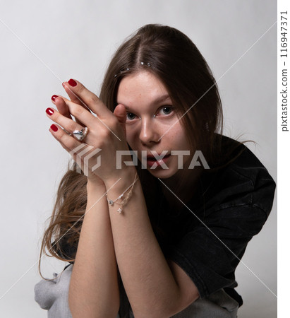 lady young hand beautiful model beauty white face person modern cap look hair portrait background 116947371