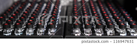 Samples in glass vials with black caps waiting for analysis in HPLC system. Samples in glass vials with black caps waiting for analysis in HPLC system. 116947631