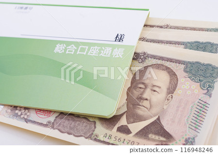 Savings passbook and lots of money Savings passbook and lots of money 116948246