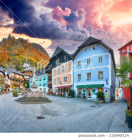 Amazing view on central square of famous Hallstatt mountain village. Amazing view on central square of famous Hallstatt mountain village. 116948524