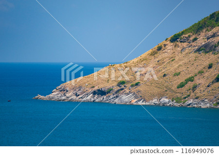 Beautiful sea surface background,Seascape view Waves water surface texture with tropical island in Phuket island Thailand Beautiful sea surface background,Seascape view Waves water surface texture with tropical island in Phuket island Thailand 116949076