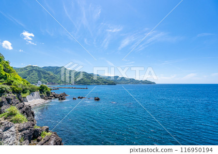 Tabibito Cape: A cape with a beautiful sunset named after the work of Naoki Prize-winning author Akira Sasakura. A panoramic view of Suruga Bay from the stepped terrace on the cliff. Tabibito Cape: A cape with a beautiful sunset named after the work of Naoki Prize-winning author Akira Sasakura. A panoramic view of Suruga Bay from the stepped terrace on the cliff. 116950194