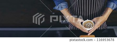Banner Coffee barista pour espresso shot and make latte art hot coffee cup. Cappuccino with milk in italian coffee shop cafe. Banner Close up hands of barista make brown latte art with copy space Banner Coffee barista pour espresso shot and make latte art hot coffee cup. Cappuccino with milk in italian coffee shop cafe. Banner Close up hands of barista make brown latte art with copy space 116953678