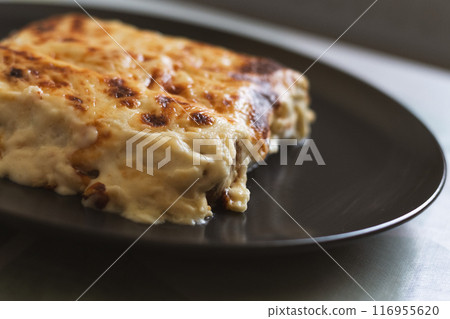 Dish of cannelloni with meat as traditional catalan christmas food Dish of cannelloni with meat as traditional catalan christmas food 116955620
