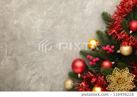 Christmas background with decorations and gift boxe on grey background. 116956228