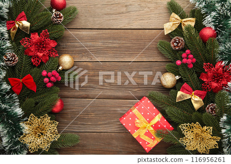 Christmas frame with Christmas decorations on grey background 116956261