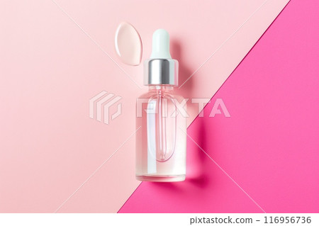 Cosmetic bottle with pipette on pink background, top view Cosmetic bottle with pipette on pink background, top view 116956736