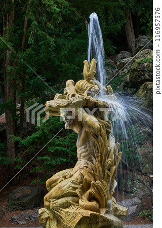 Statue of Neptune and Grotta fountain in Grebovka Havlickovy sady gardens in Vinohrady district in Prague, capital of Czech Republic 116957576