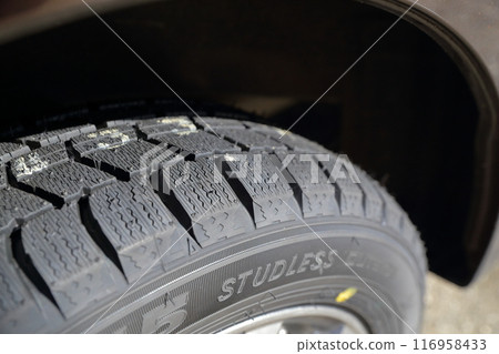 Close-up of studless tires Close-up of studless tires 116958433