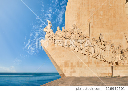 Lateral view of Monument of Discoveries, Padrao dos Descobrimentos, to Age of Discoverys haped as ship with statues of Prince Henry the Navigator and great people of Portuguese seafarers history Lateral view of Monument of Discoveries, Padrao dos Descobrimentos, to Age of Discoverys haped as ship with statues of Prince Henry the Navigator and great people of Portuguese seafarers history 116959501