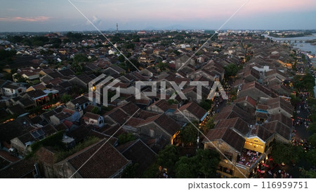 the lantern boats on the canal in hoi a night market in vietnam.the old town was a Southeast Asian trading port from the 15 to 19th century, now it become the resort city 116959751