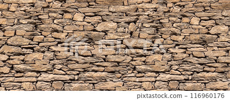 Brown stone wall 116960176