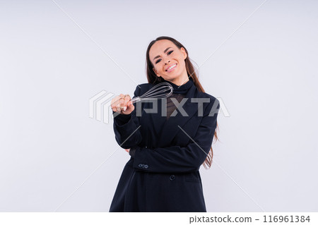 Young thoughtful pensive wistful fun housewife. Cooking food process concept. Young thoughtful pensive wistful fun housewife. Cooking food process concept. 116961384